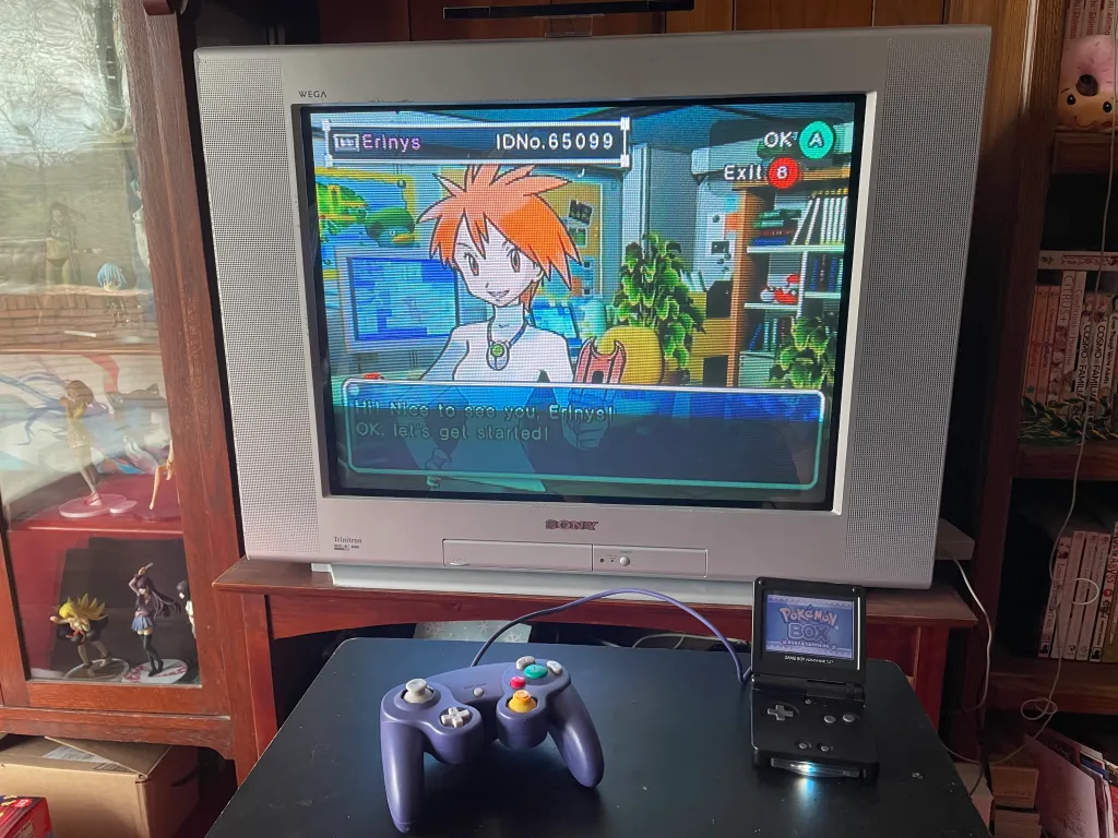 A Game Boy Advance connected to a television screen